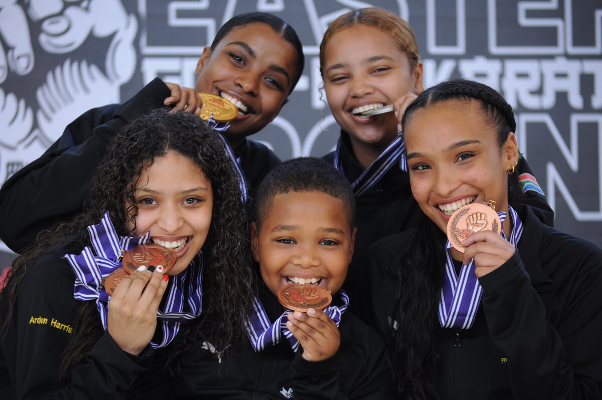 Nelson Mandela Bay karatekas, (back row from left) Zeenat Lee and Danielle Whitebooi, and front row from left, Arden Harris, Mattheu Erasmus and Kezia Abersalie, won medals in the recent 8th Goju World Championship Journey in Chiba, Japan.