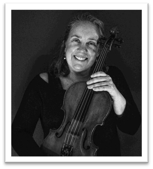 Louise Lansdown with a musical instrument in her hand.