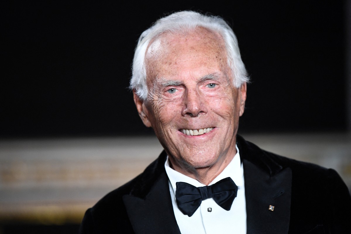 (FILES) Italian fashion designer Giorgio Armani acknowledges the audience at the end of his 2019 Spring-Summer Haute Couture collection fashion show in Paris, on January 22, 2019. Italian fashion great Giorgio Armani has died at the age of 91 "surrounded by his loved ones", his company said on September 4, 2025. (Photo by Anne-Christine POUJOULAT / AFP)