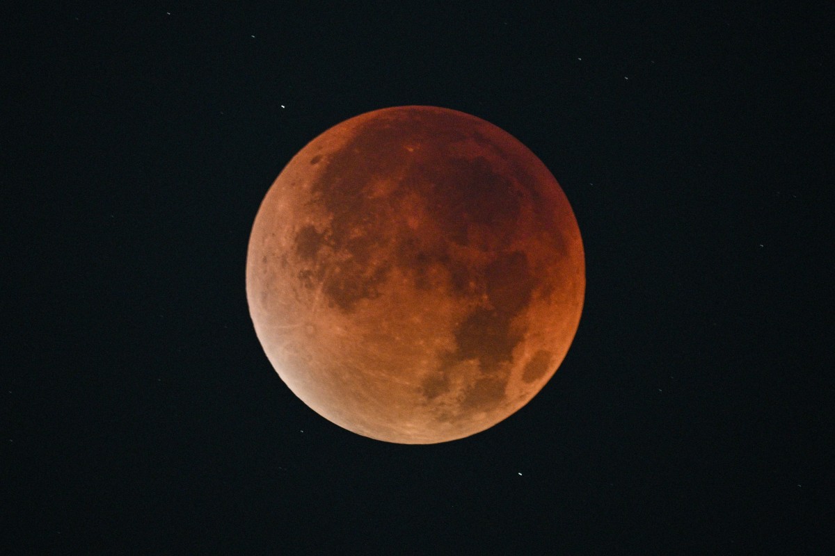 Stargazers in large parts of the world enjoyed a Blood Moon Sunday evening during a total lunar eclipse visible across Asia and parts of Europe and Africa.