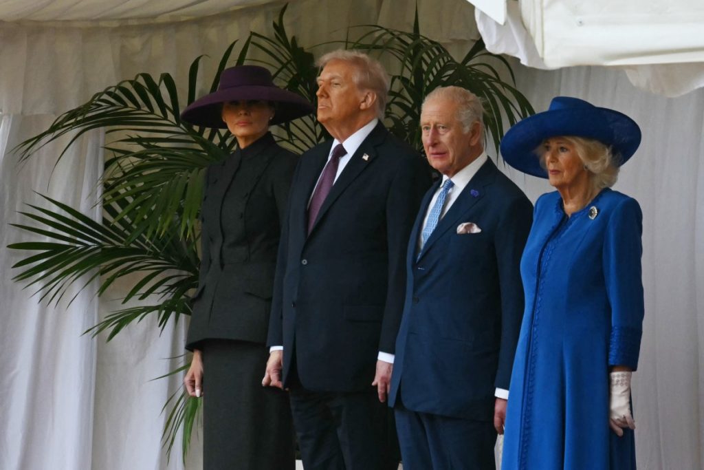 US First Lady Melania Trump, US President Donald Trump, Britain's King Charles III and Britain's Queen Camilla during a ceremonial welcome in the Quadrangle at Windsor Castle, in Windsor. (Photo by Andrew Caballero-Reynolds / AFP)