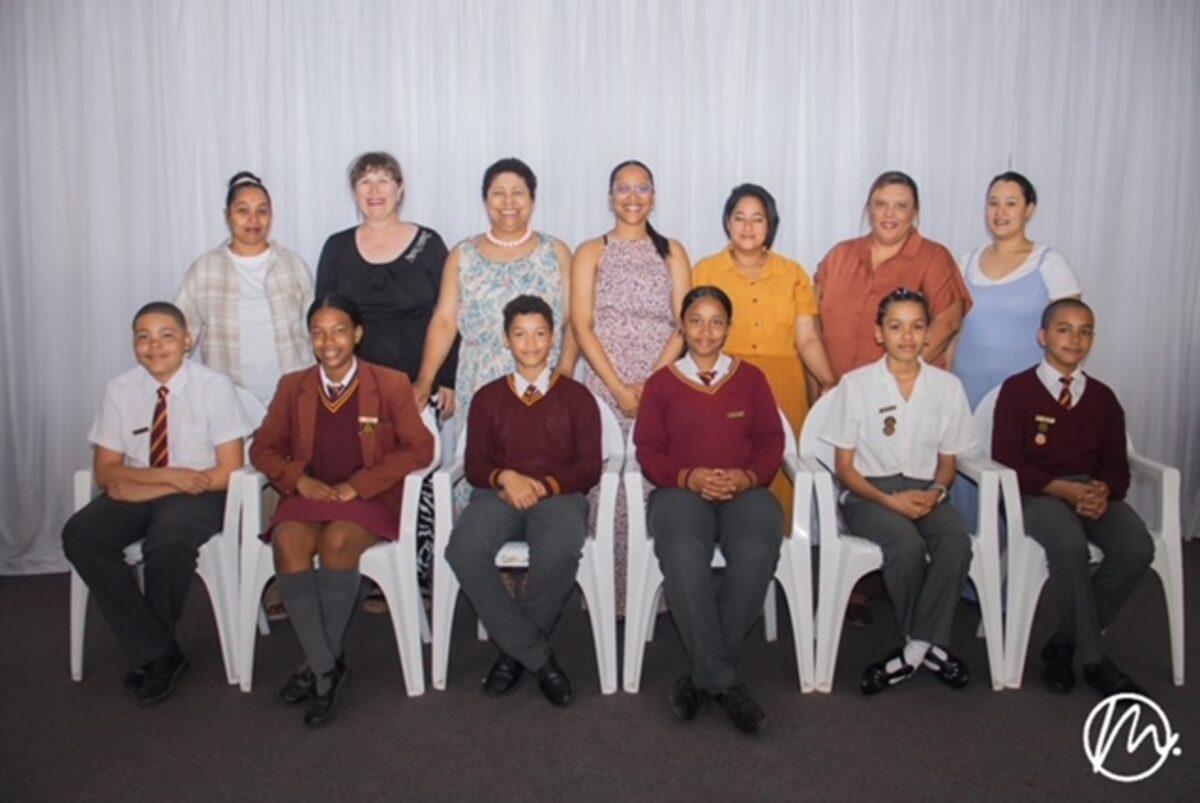 The committee members of the dinner gala, and the head prefects at Triomf Primary.