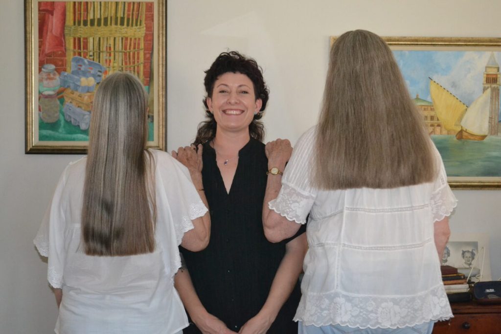 Jennifer Strong (77), Senior Stylist Louise Ilsley and Polly Van Niekerk (74) after the sisters' volunteered to have their hair donated to Cansa.