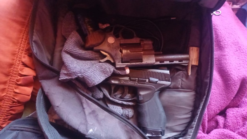 The two firearms found in possession of the suspect.