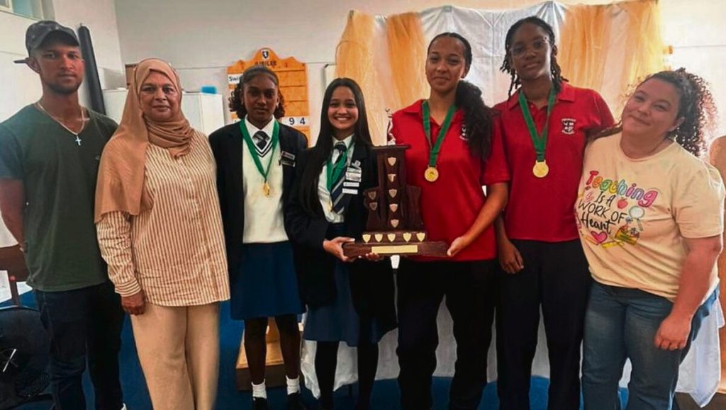 Coach Ezra Padayachee, Durriyah Salie, Abigail Moodaley and Tabina Wajid from Woolhope Secondary School with Caris McCarthy, Gie McKenzie and coach Elana Lewis from Willow Academy.