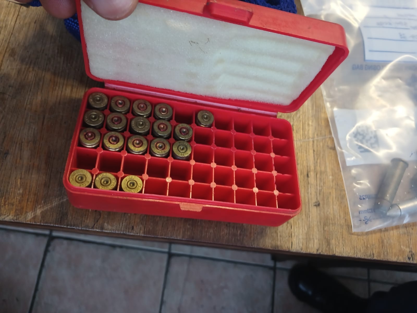 SAPS found eighteen 9mm spent cartridges. in suspects' possession.