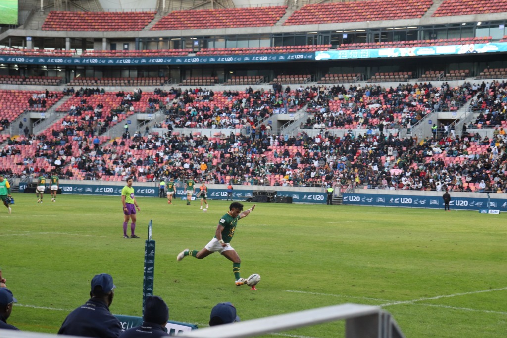 Yaqeen Ahmed kicking a conversion.
