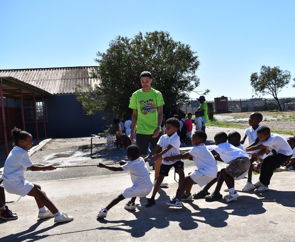 Children pulling rope, a tug-of-war.