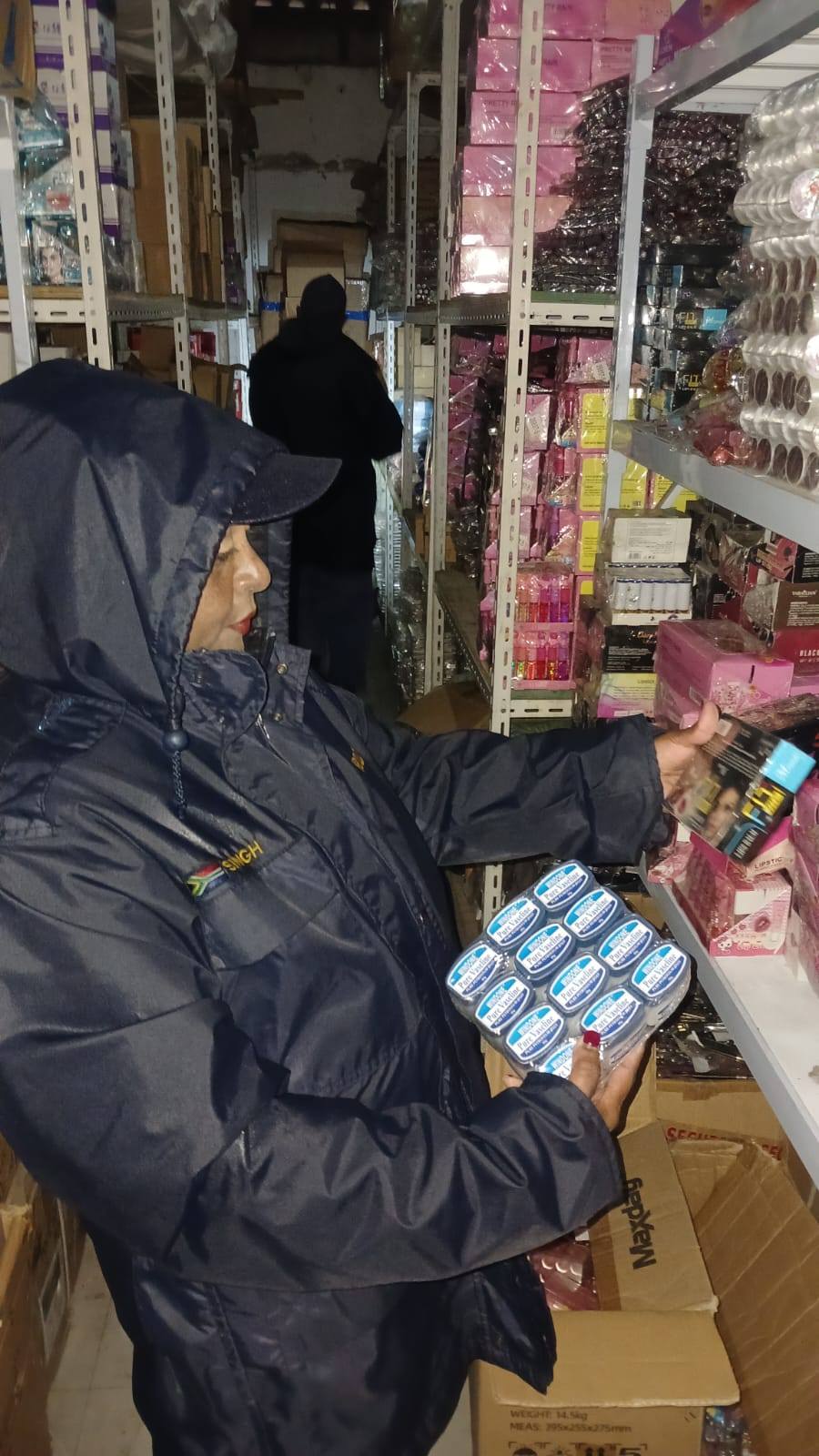 Police seized counterfeit goods, including clothing, medicines and hair products.