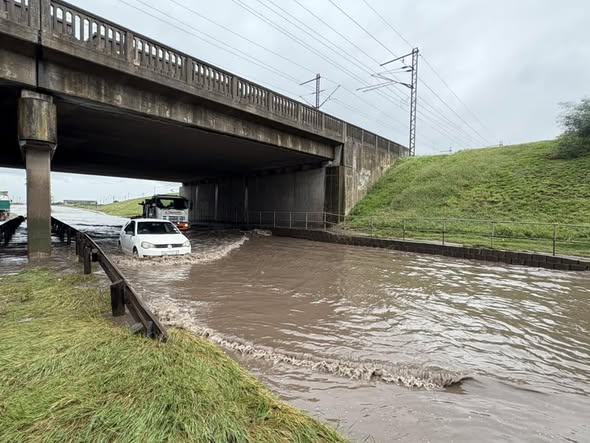 Addo Road (R335) near the train bridge in Motherwell was flooded.