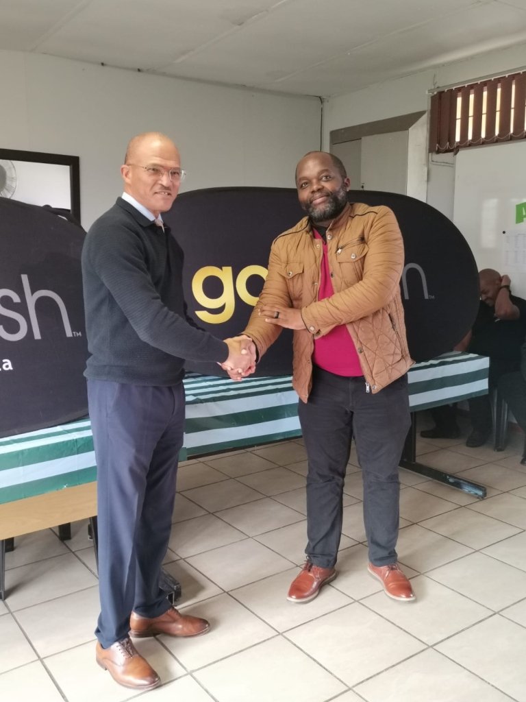 2 men shaking hands