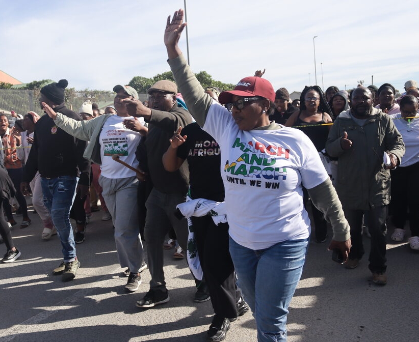 March and March protesters march to Lwandle Police Station demanding closure of all foreign-owned spaza shops.