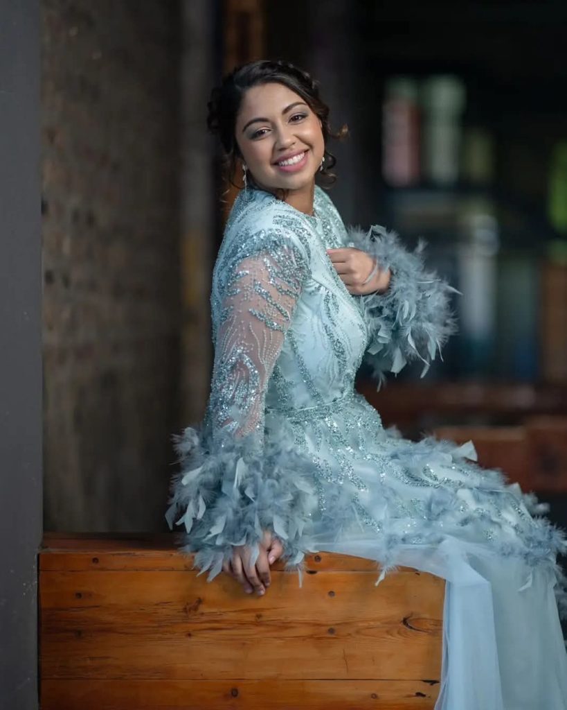 Lady posing in front of the camera