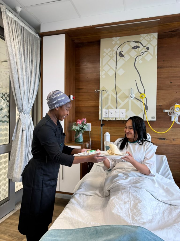 Patient receiving a meal at Edge Day Hospital.