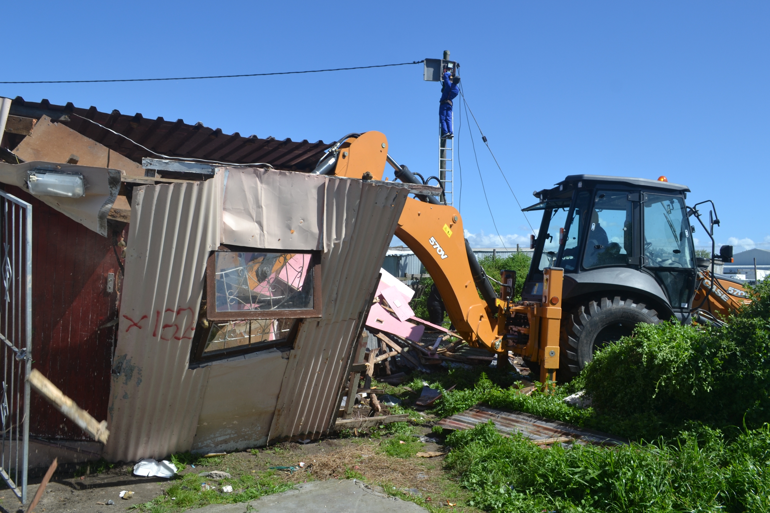 Informal structures were demolished to make way for a 445-unit housing development in Airport Valley.