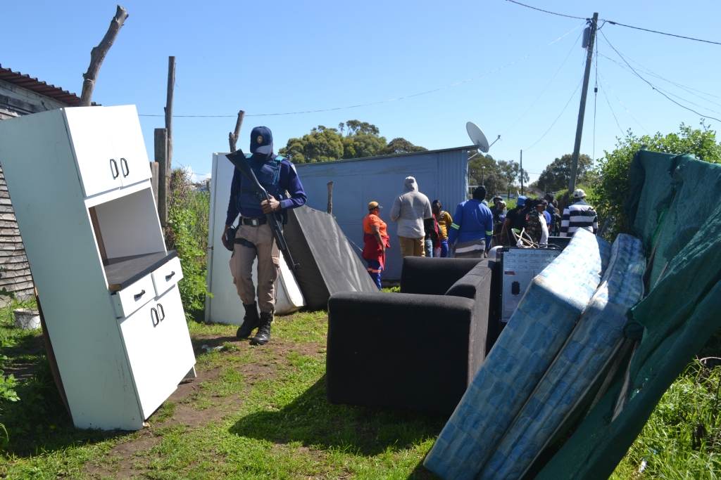 Furniture and other belongings removed from informal structures before demolition in Airport Valley.