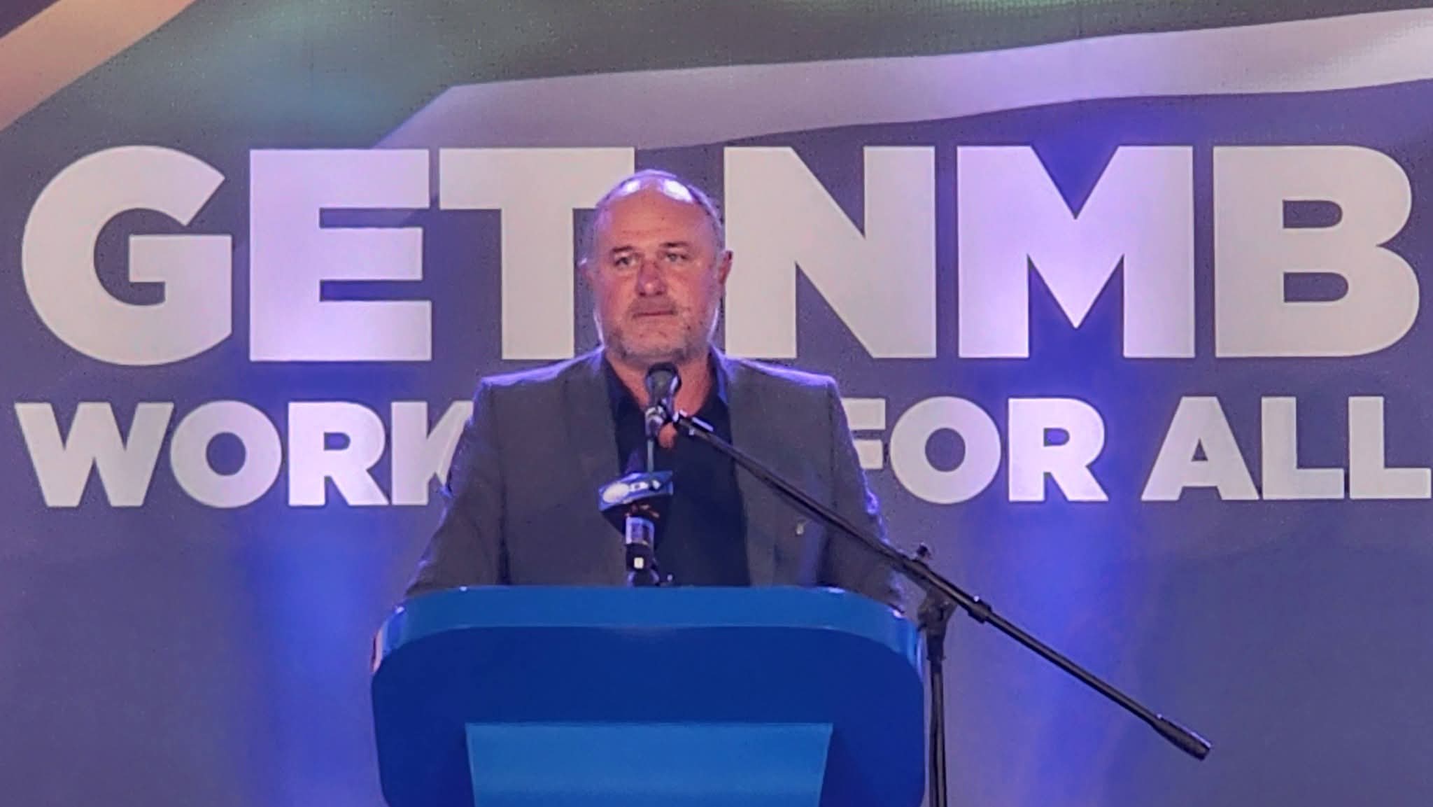 DA mayoral candidate Retief Odendaal addresses supporters at a final campaign rally.