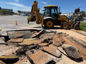 Martin Road closed after water main burst causes road collapse