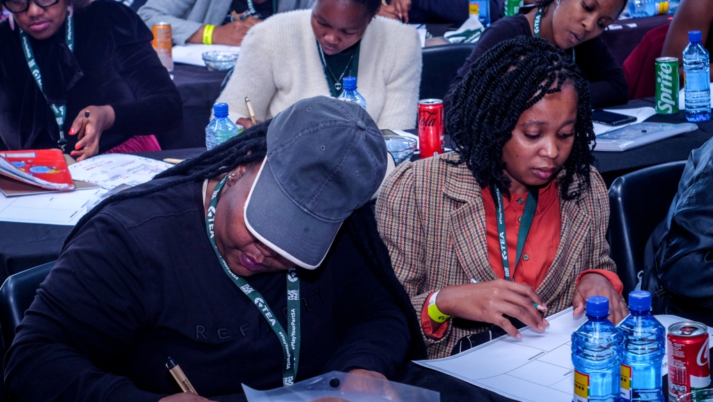 Participants work through worksheets during a practical masterclass at a previous TEA workshop.