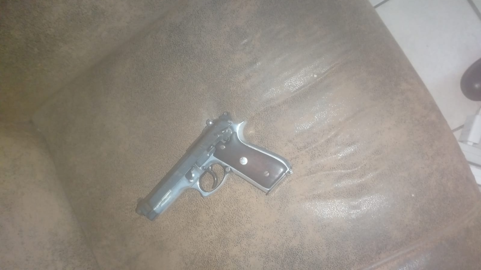 A firearm found in the possession of a suspect.