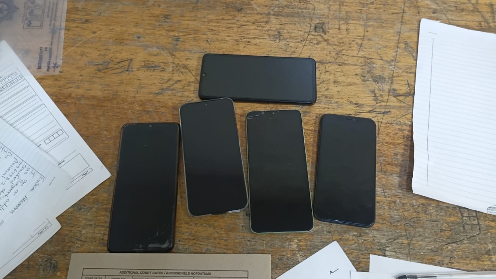 Five cellphones matching the complainantsโ descriptions were found in the suspects' possession.