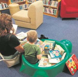 Patrons pop champagne at news of Plumstead Library’s lease renewal
