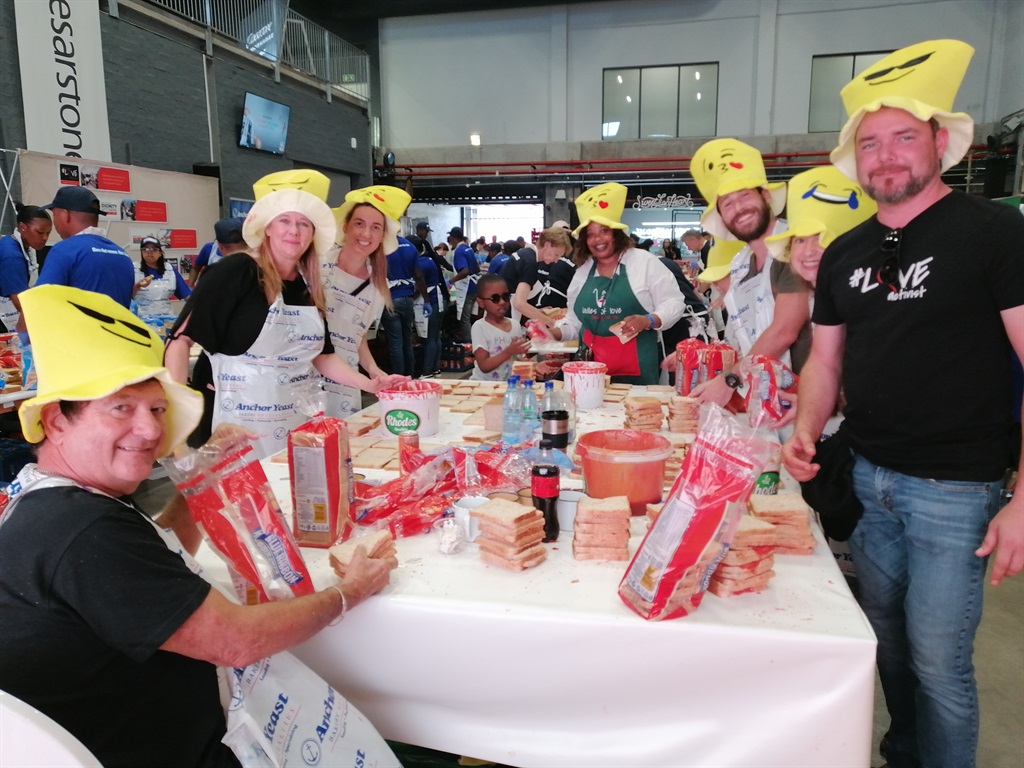 Members from Team Smile Makers made 3 000 sandwich