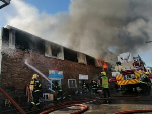 PICS | Man injured as blaze guts building in Woodstock, Cape Town