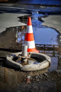 Burst pipe outs traffic, water
