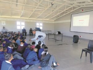 Teaching children the dangers of drugs and gangsterism