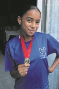 Zhea goes for gold: Vault queen takes national gymnastics honours