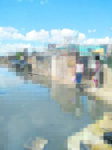 ‘Smelling really bad’: Pipe burst at informal settlement leaves residents helpless
