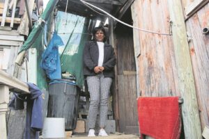 Frustrated Karbonkelberg residents in Hout Bay blame high concrete walkway for regular flooding of dwellings