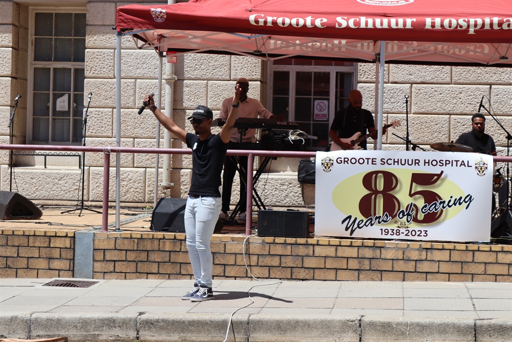 Local artist Keanu Harker entertains the crowd dur