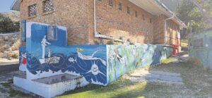 Simon’s Town Long Beach transformed with educational murals