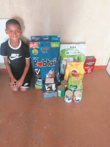 Nine-year-old helps feed stray dogs in Ocean View