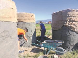 American college football team help build water tanks in Lavender Hill, Cape Town