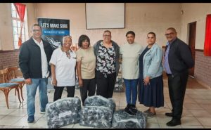 Joy in Lotus River as St Clements RC Primary learners receive donated school shoes
