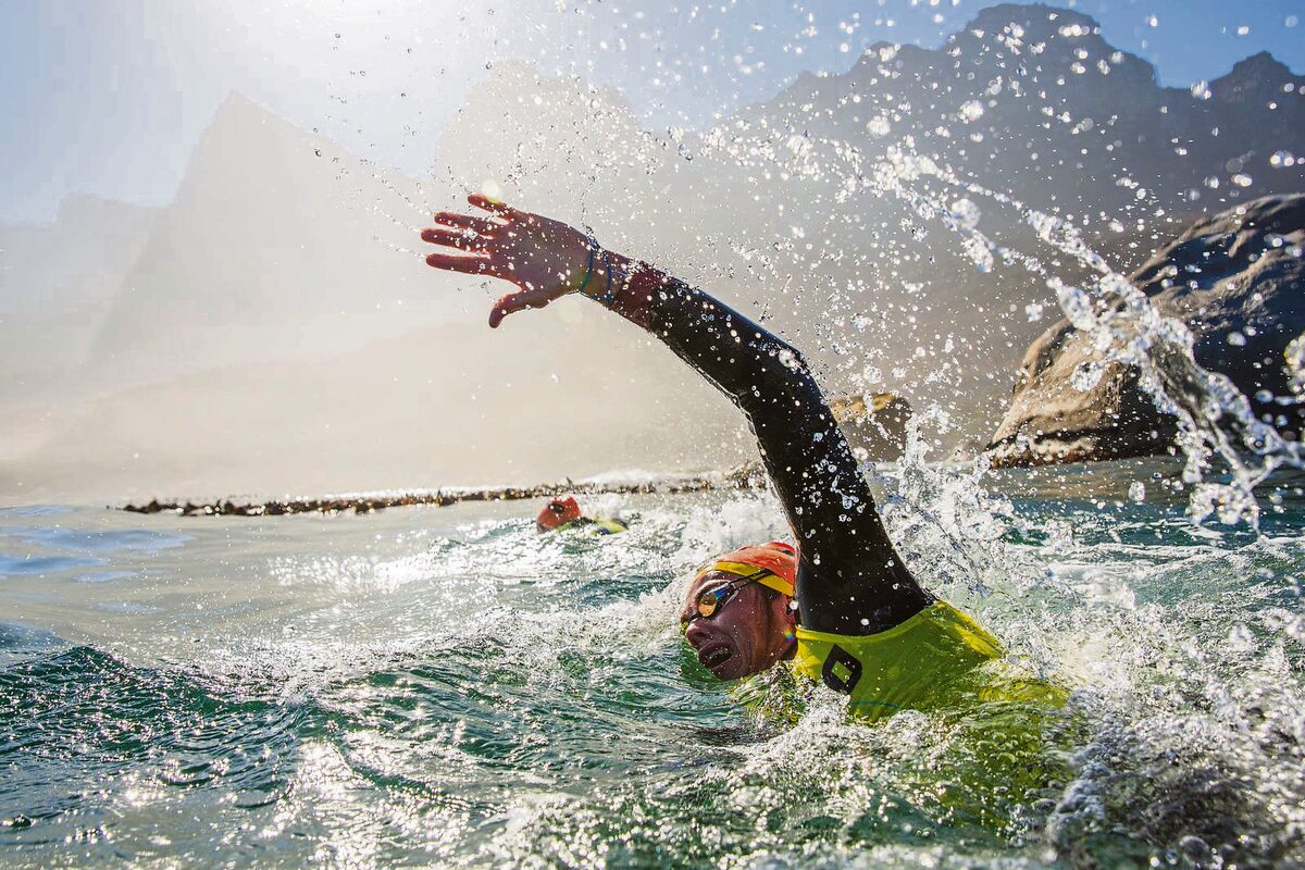 An athlete competes in the open-water swim section of the Torpedo SwimRun between Sandy Bay and Clifton. Photo: Torpedo SwimRun/Caleb Bjergfelt