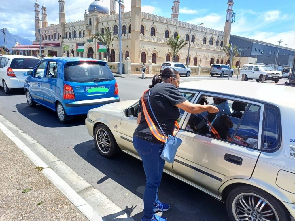 Members helped distribute flyers for 16 days of activism.