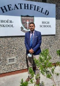 Former principal wins five-year court battle