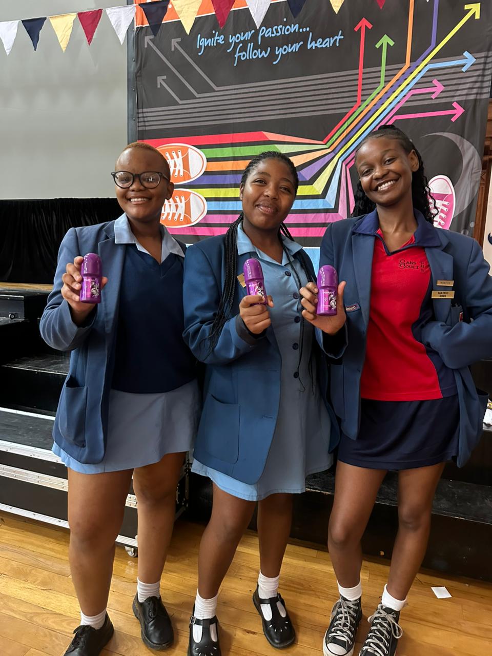 Learners show deodorant products received during the Rocking Future career expo