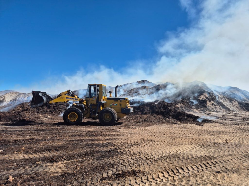 The smouldering heaps