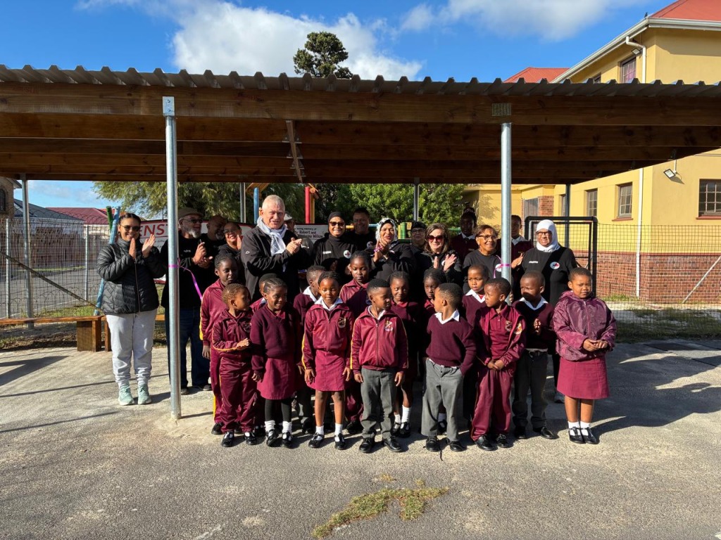 Kenstra members and learners celebrate the new sheltered waiting