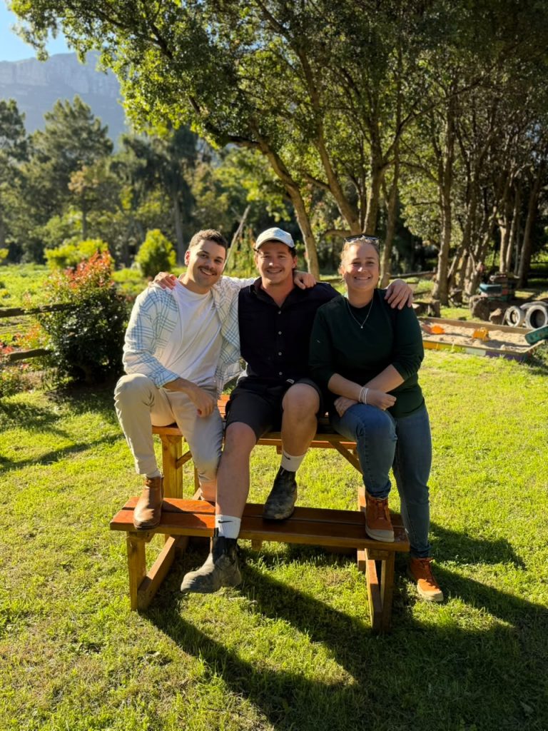 Matthew Kieswetter, Matthew van Eck and Tjarla Norton of Love in a Bowl at the Hout Bay food-security initiative.