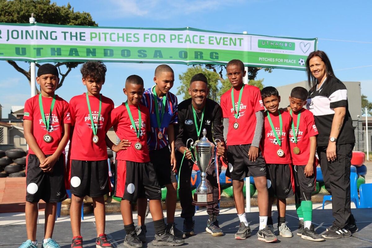 Learners at Vanguard Primary School in Heideveld play on a new five-a-side football pitch