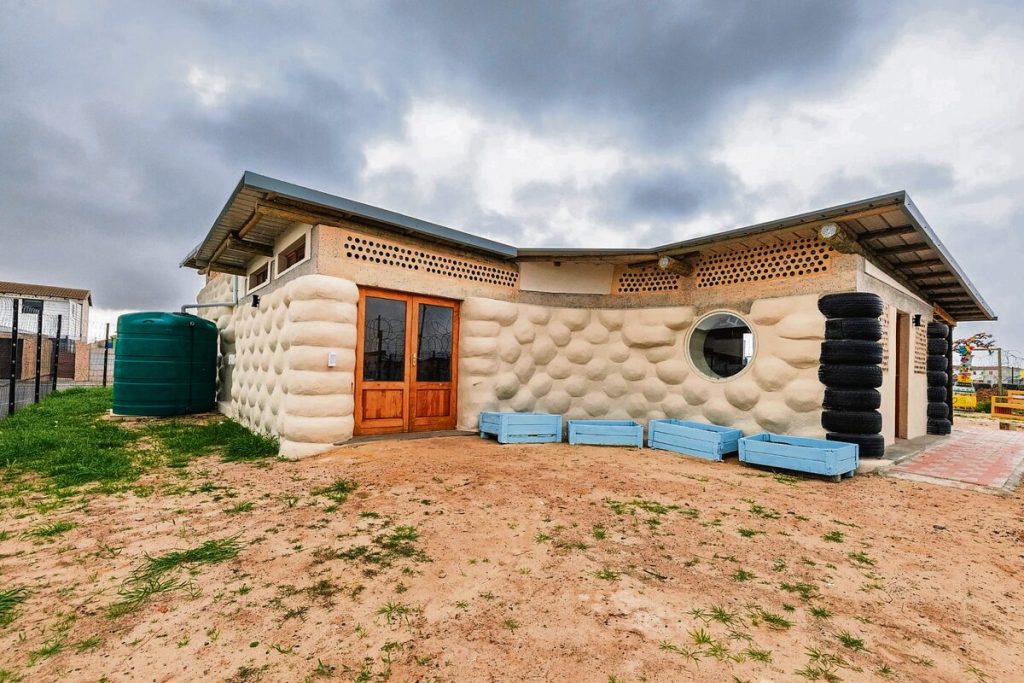 Eco-bricks made from plastic bottles packed with non-biodegradable waste for the Waste to Wonder project