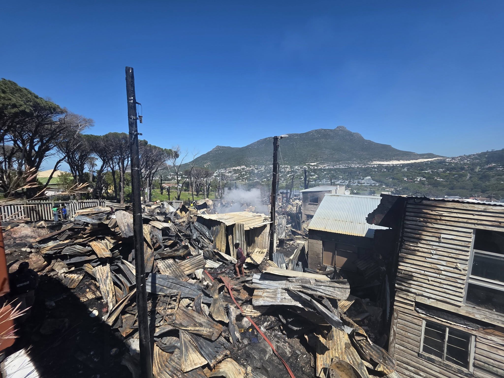 About 400 residents are homeless after a fire destroyed about 80 informal structures in Imizamo Yethu, Hout Bay, on Sunday 11 October. Photo:Supplied
