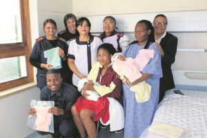 Babas deur breiwerk ondersteun