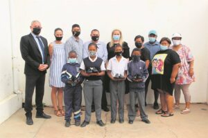 Rdata donates school shoes to pupils